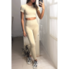 Ensemble legging et top sport beige en matière gênante