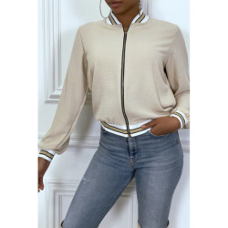 Veste fluide beige légère à zip et bordure dorée