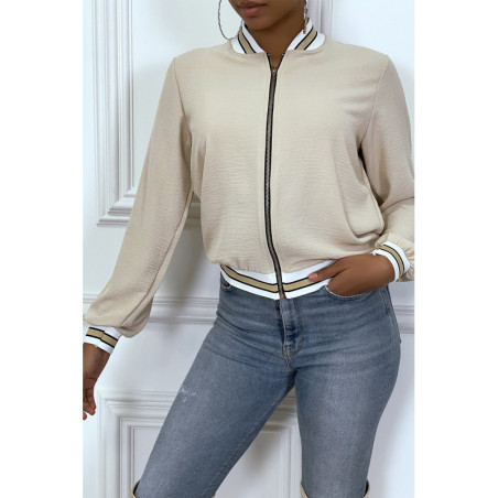 Veste fluide beige légère à zip et bordure dorée