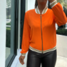 Veste fluide orange légère à zip et bordure dorée