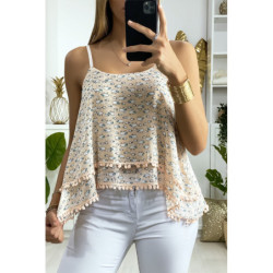 Débardeur rose à volant avec motif et mini pompon