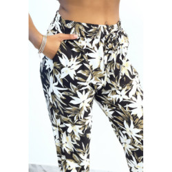 Pantalon fluide noir imprimé tropical resserré aux chevilles