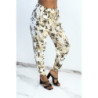 Pantalon fluide beige imprimé tropical resserré aux chevilles