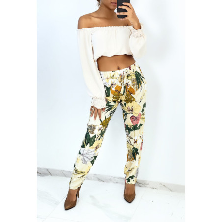 Pantalon fluide beige coupe droite à large imprimé tropical
