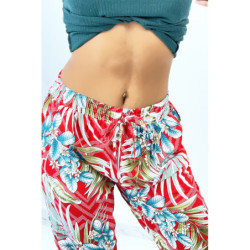 Pantalon fluide rouge à rayures en pointillés et imprimé floral