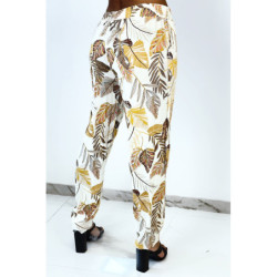 Pantalon fluide beige coupe droite à imprimé plumes multicolors