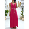 Longue robe croisé en fuchsia avec ceinture en cordon