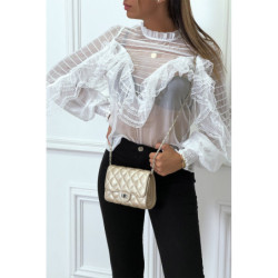 Blouse blanche en tulle avec broderie et volant