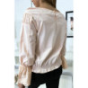 Blouse rose plissé au buste avec volant en dentelle aux manches