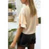 Blouse rose en crêpe avec volants aux manches